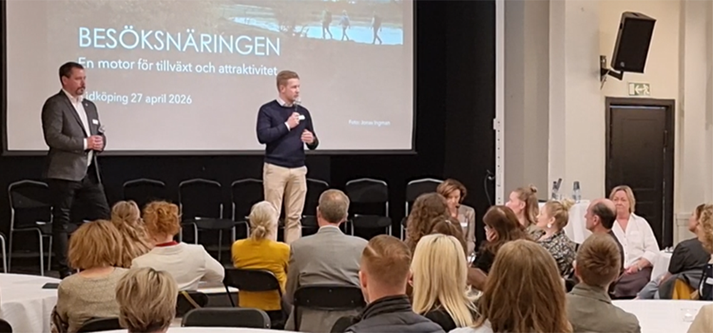 Talare på konferense